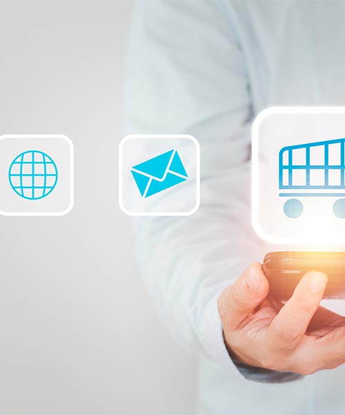 A person holding a smartphone with glowing icons for internet, email, and online shopping, symbolizing digital services.