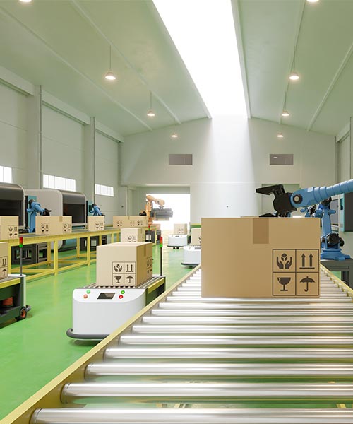 Automated production line with cardboard boxes on a conveyor belt in a modern logistics facility.